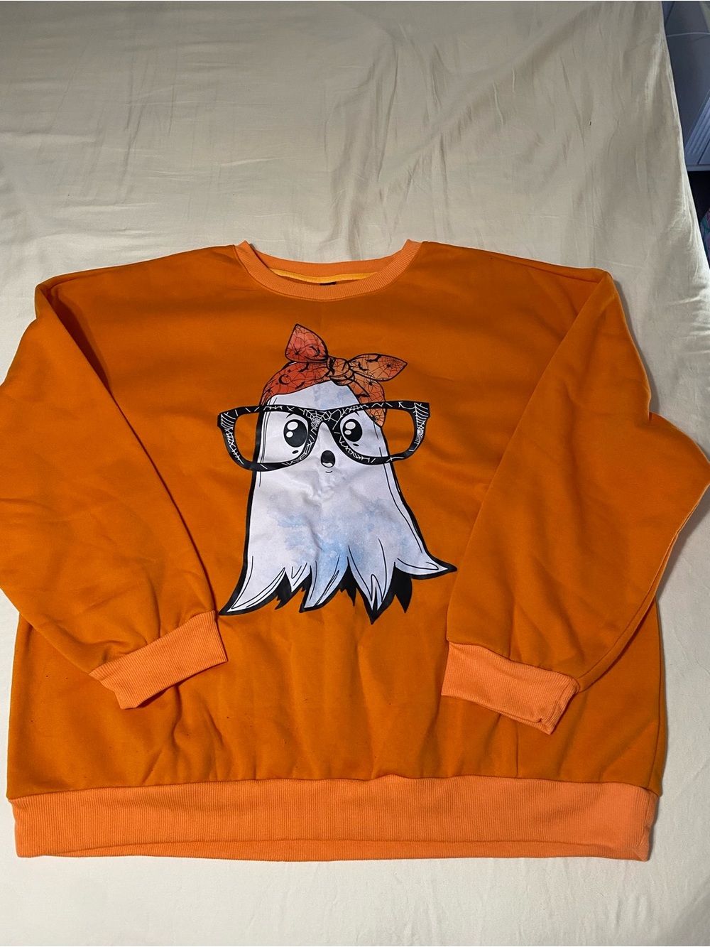 Women’s Orange Graphic Ghost Sweatshirt with Bandana and Glasses